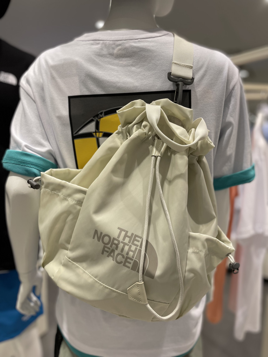 THE NORTH FACE - W LIGHT BONNEY PACK (WHITE_SAND)